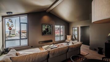 Loft suite with ocean view | Premium bedding, down comforters, minibar, desk