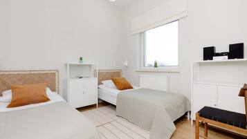 2 dormitoris, planxa i posts de planxar, wifi i roba de llit