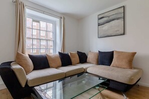 Basic Apartment | Living area | TV - Inviting 2BD Flat 15 Minutes From Regents Park! (London)