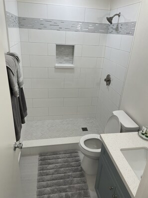 Hair dryer, towels, soap, toilet paper