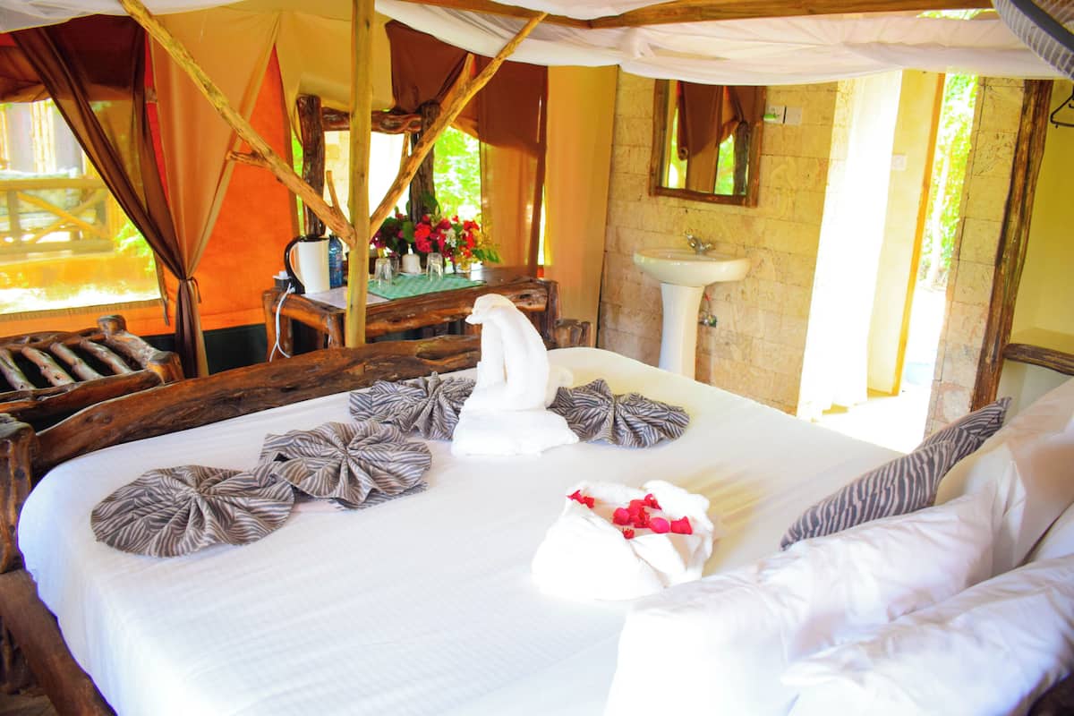 Deluxe Tent, 1 Double Bed, Balcony, Garden Area | Down comforters, individually furnished, desk, laptop workspace