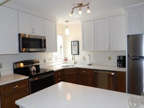 Fridge, microwave, dishwasher, coffee/tea maker