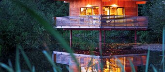 Spectacular tiny house in a pond with terrace and fireplace