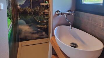 Shower, eco-friendly toiletries, hair dryer, soap