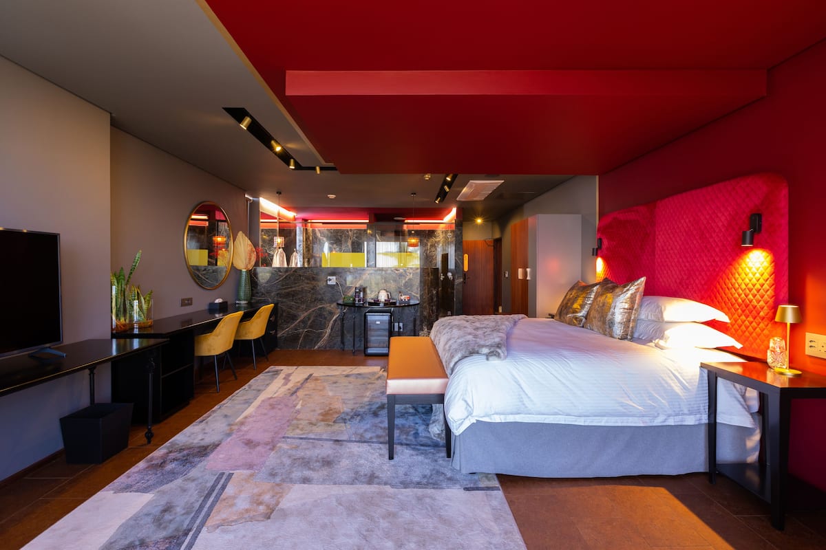 Executive Suite, Bathtub, Sea View | In-room safe, desk, laptop workspace, iron/ironing board (on request)