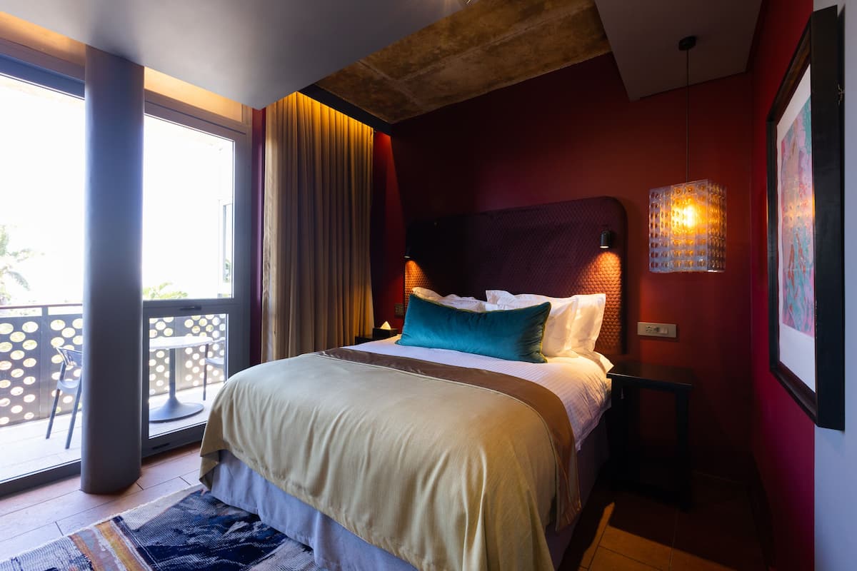 Deluxe Room, Balcony, Sea View | In-room safe, desk, laptop workspace, iron/ironing board (on request)