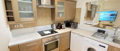 Apartment | Private kitchen | Fridge, microwave, oven, stovetop
