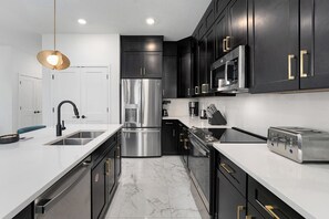 Fridge, microwave, oven, stovetop - Villa Sol | Grand villa w/ minion theme BR & more amenities, mins to Minion Land (Orlando)