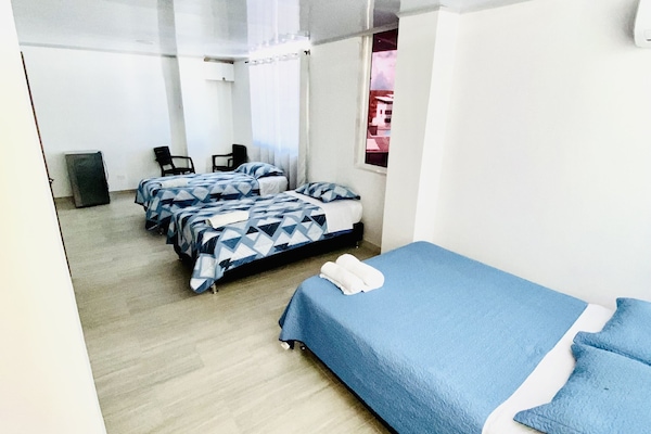 Basic Quadruple Room | Down comforters, laptop workspace, free WiFi