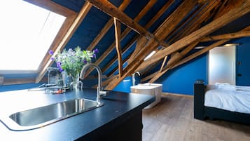 Deluxe Suite, 1 King Bed | 1 bedroom, premium bedding, in-room safe, individually decorated