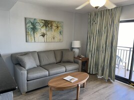 Traditional Condo, 1 Bedroom, Ocean View | Living area | 50-inch Smart TV with cable channels, streaming services, printers