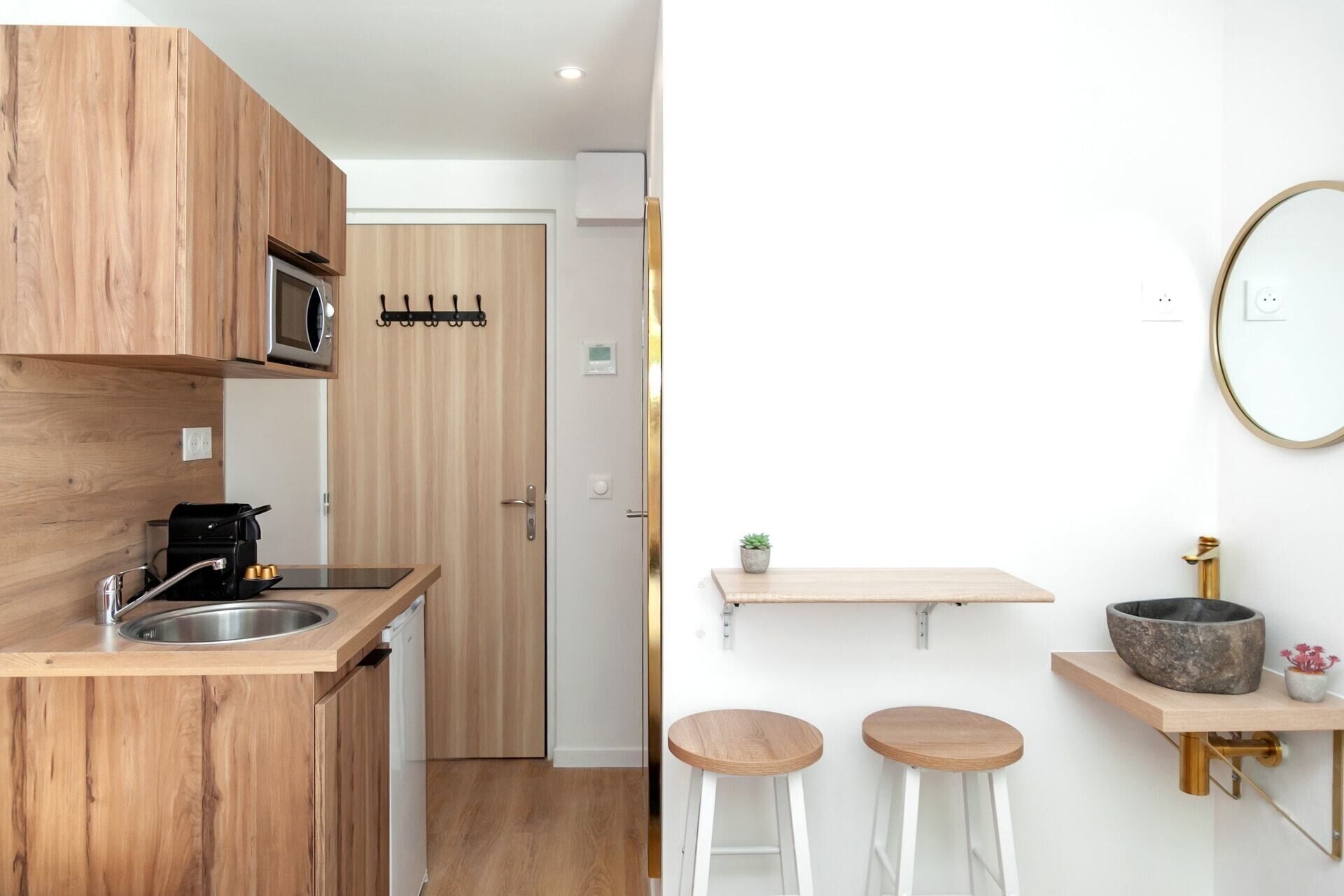 Fridge, microwave, coffee/tea maker, cookware/dishes/utensils