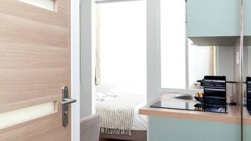 1 slaapkamer, een strijkplank/strijkijzer, gratis wifi, beddengoed