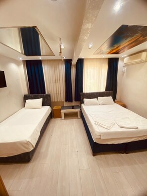 Standard Triple Room | Minibar, soundproofing, free WiFi, bed sheets