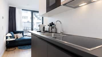 Suite ejecutiva, 1 habitación, para no fumadores | Cocina privada | Refrigerador, microondas, horno y parrilla de estufa