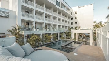 Outdoor pool, open 7:00 AM to 11:00 PM, pool umbrellas, sun loungers