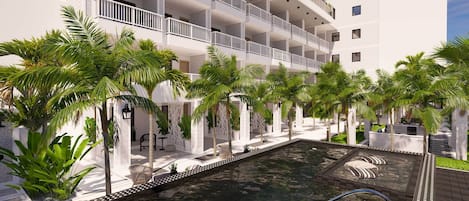 Outdoor pool, open 7:00 AM to 11:00 PM, pool umbrellas, sun loungers