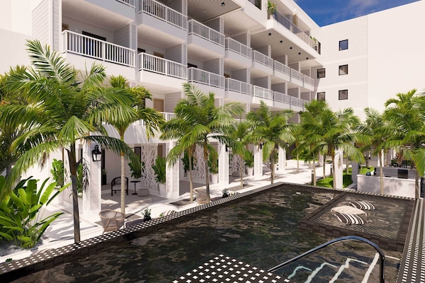 Outdoor pool, open 7:00 AM to 11:00 PM, pool umbrellas, sun loungers