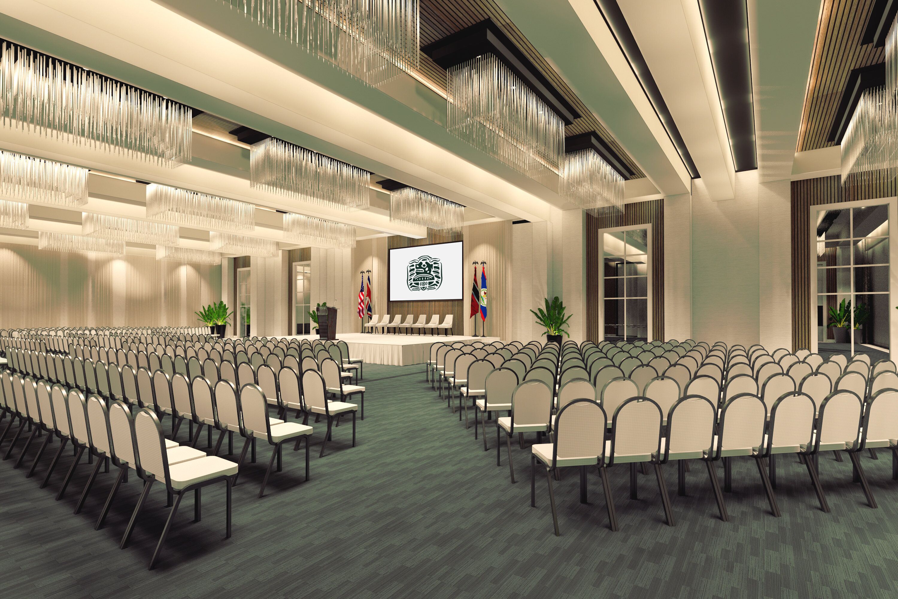 A conference room with rows of chairs, a podium, flags, and a projection screen.