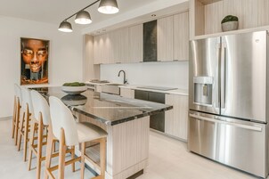 2 Bedroom Penthouse Suite | Private kitchen | Espresso maker, coffee/tea maker, highchair