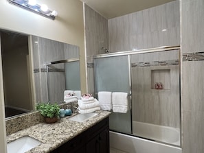 Hair dryer, towels, soap, shampoo