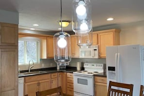 Fridge, microwave, oven, stovetop - Updated Open concept Fully Stocked Kitchen Close To Everything & Pet Friendly   (Ogden)
