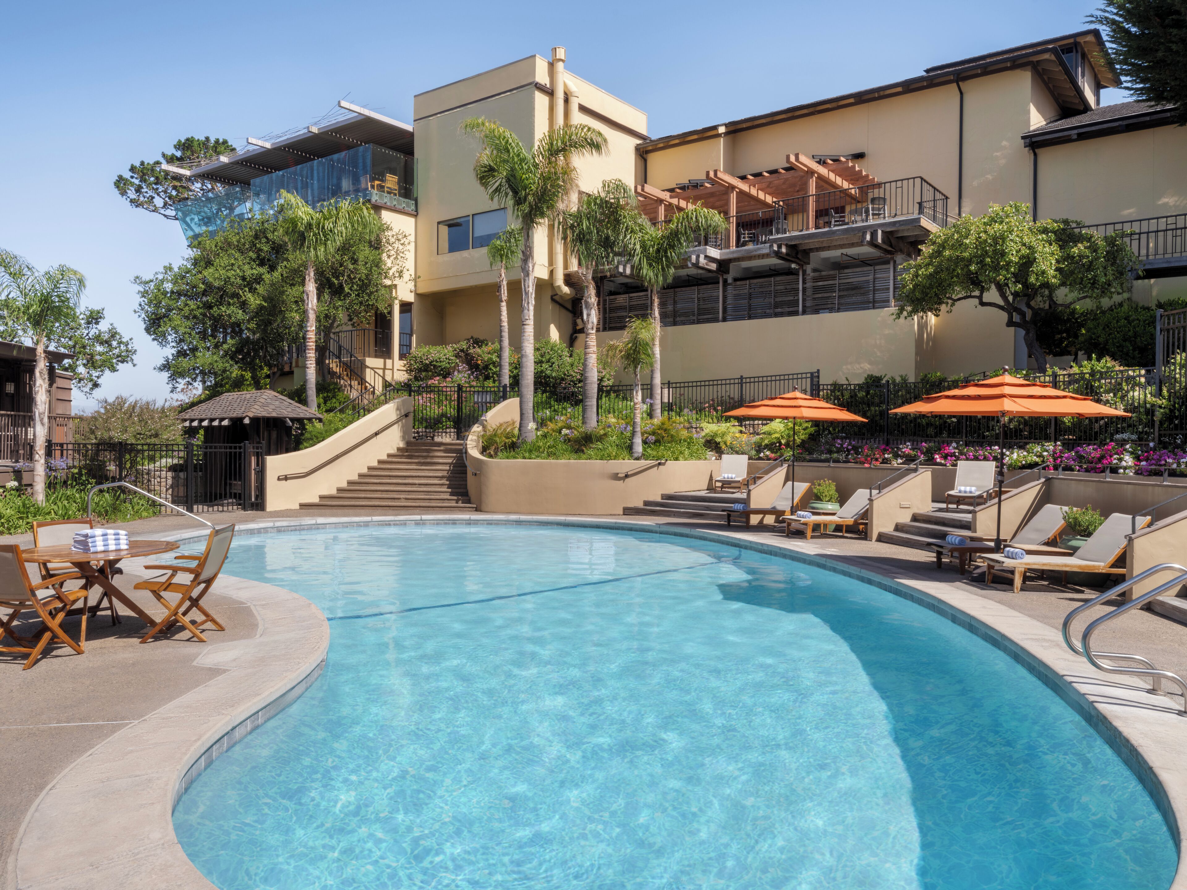 Outdoor pool, open 6:00 AM to 10:00 PM, free pool cabanas