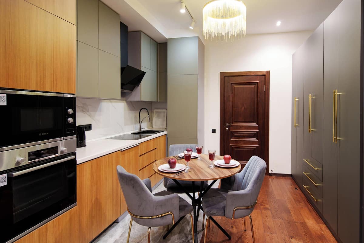 Junior Apartment - windows overlook the wall | Private kitchen | Full-sized fridge, microwave, oven, stovetop