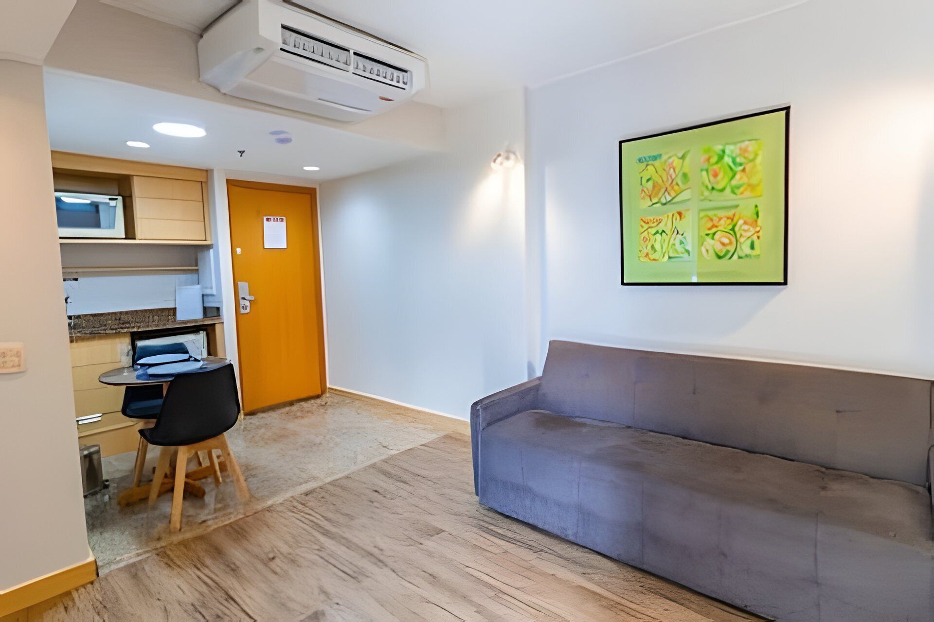 Apartment | Living area | 30-inch TV with cable channels