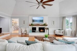 TV, fireplace - Experience Timeless Luxury at Cavalier Manor on a Lake (Portsmouth)