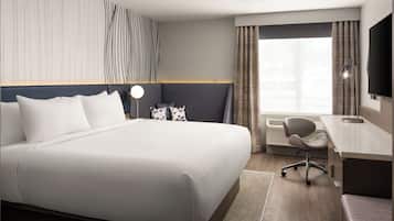 Desk, laptop workspace, blackout drapes, iron/ironing board