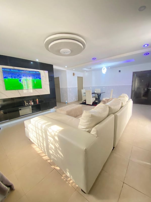 Premium Apartment | Living area | 40-inch flat-screen TV with cable channels