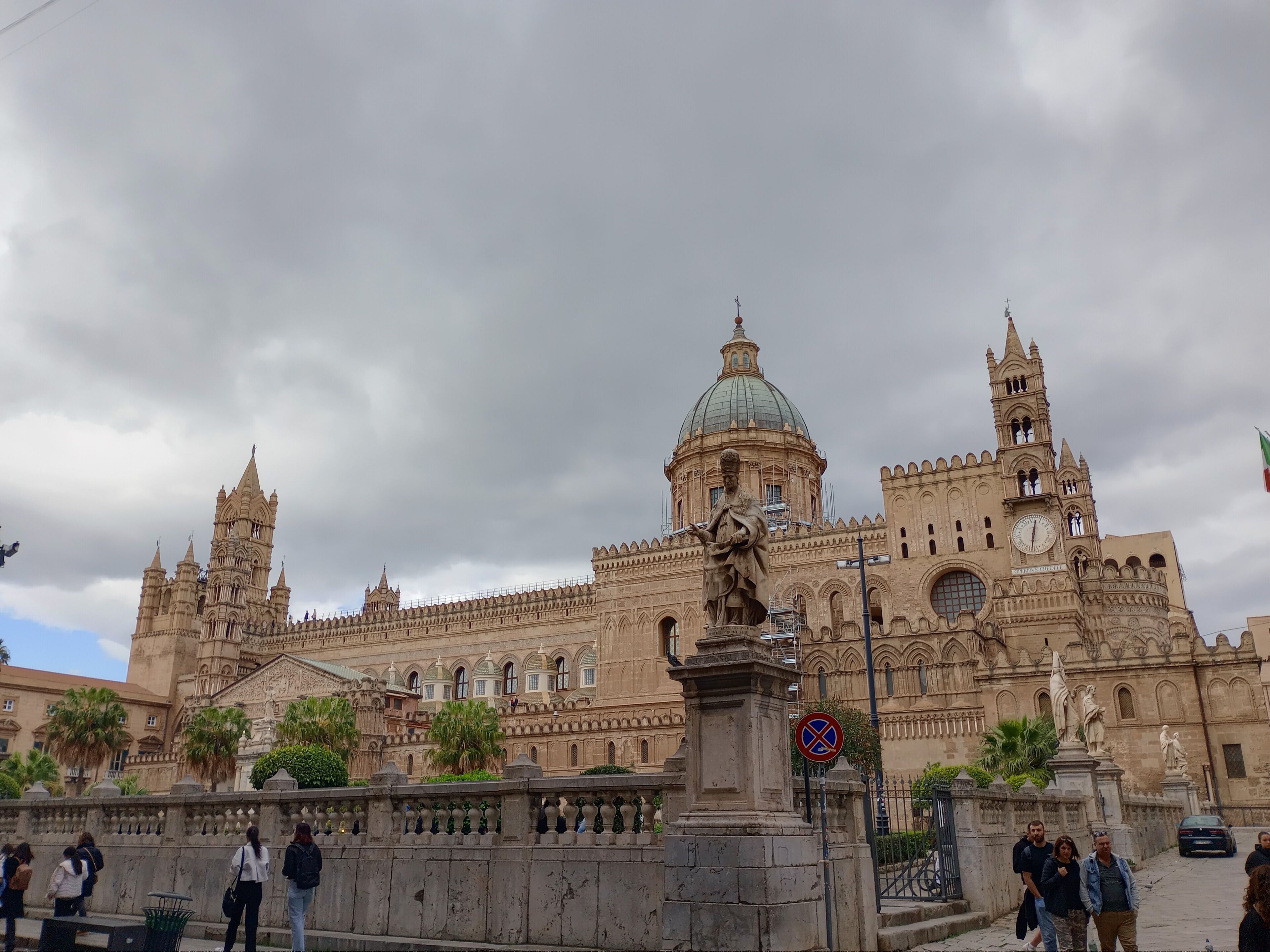 A historic building with intricate architecture, including a prominent dome and multiple towers.