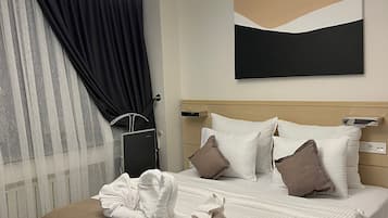 Ropa de cama de alta calidad y minibar