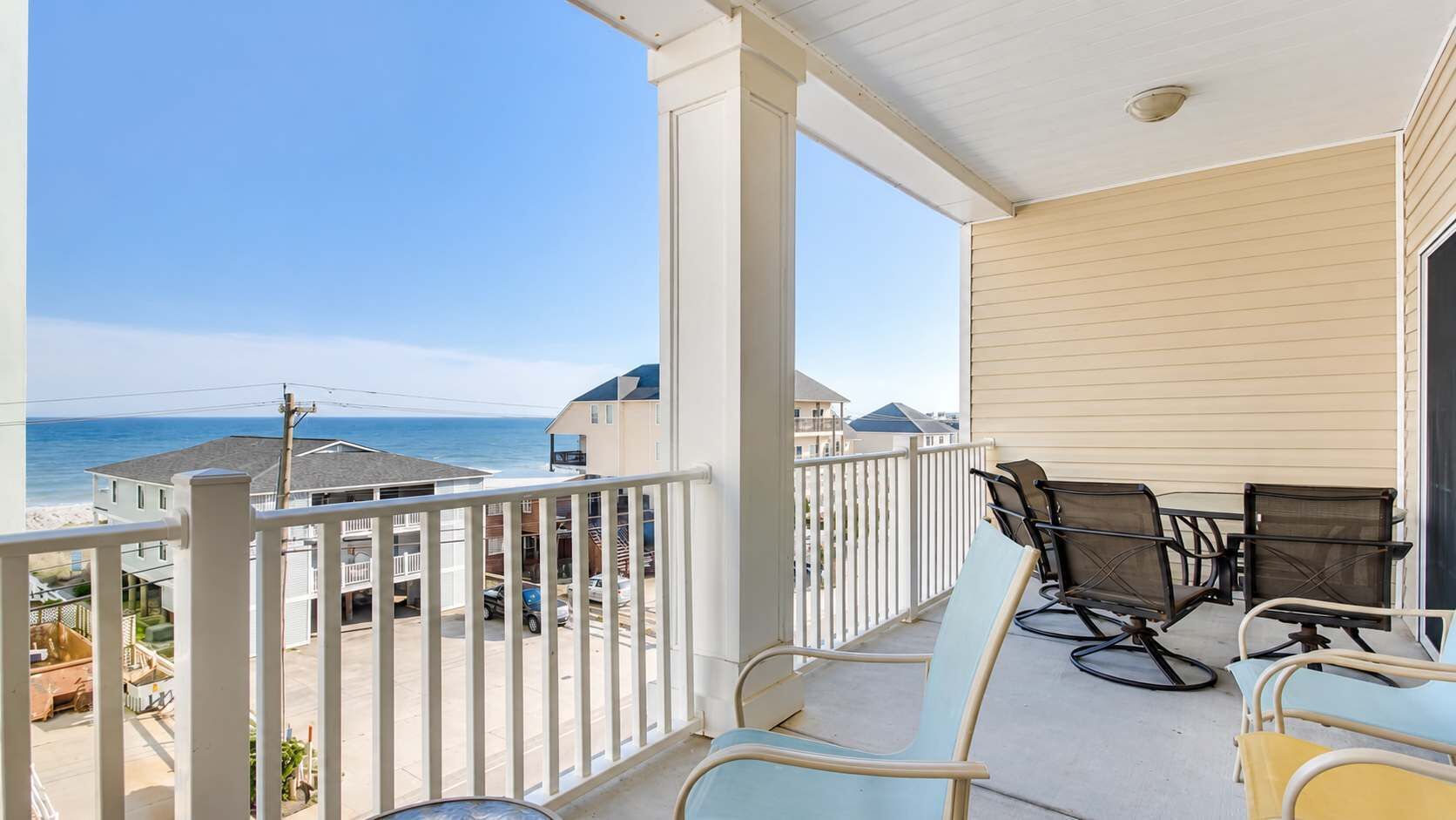 Look past the beach houses to the Atlantic, right from the balcony.