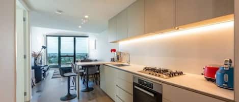 Coffee/tea maker, fridge, microwave, oven
