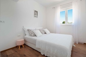 Apartamento | 2 quartos, Wi-Fi de cortesia, roupa de cama
