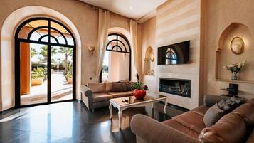 Villa | Living area | Fireplace