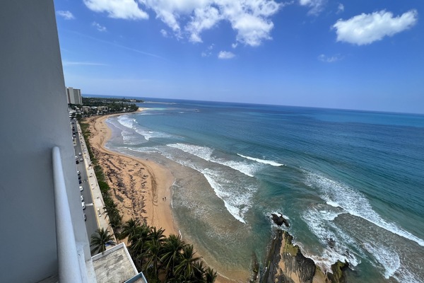 On the beach, sun loungers, beach towels