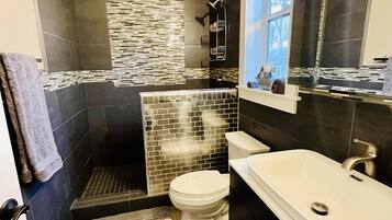 Shower, hair dryer, towels, soap