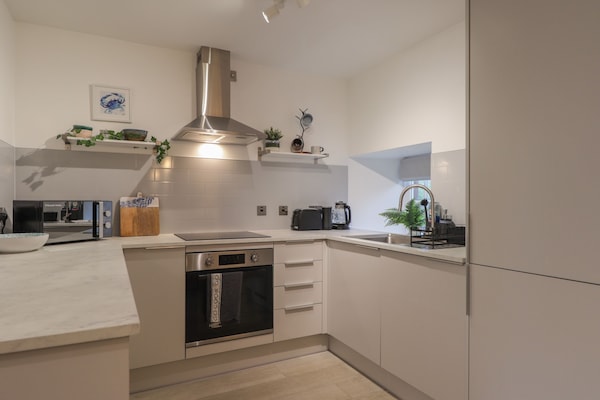 Fridge, electric kettle, toaster, cookware/dishes/utensils