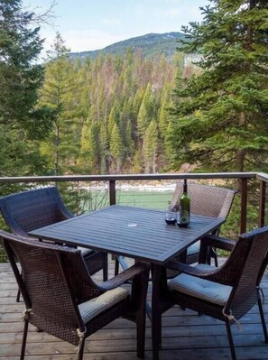 Outdoor dining - Glacier Log Home with Private River Access (Coram)