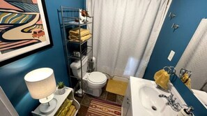 Hair dryer, towels, soap, shampoo