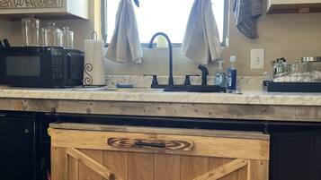 Fridge, microwave, coffee/tea maker, toaster