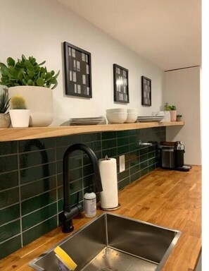 Microwave, high chair - Cozy, Nature-Inspired Urban Retreat (Washington)