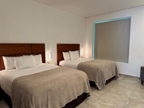 Premium bedding, down comforters, pillowtop beds, in-room safe - Hotel Boutique Murana Tulum (Tulum)