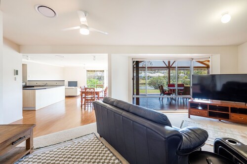 Oyster Cove Sunsets-Nestled along a tranquil canal.