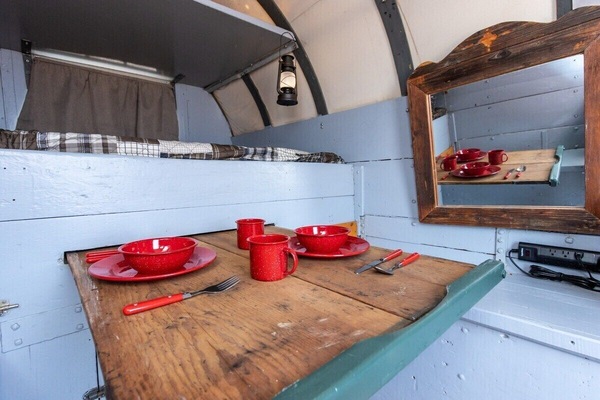 A slide out table is perfect for enjoying a meal...