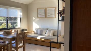 Superior appartement | Woonruimte | Een flatscreentelevisie