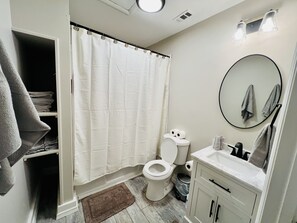Hair dryer, towels, soap, shampoo